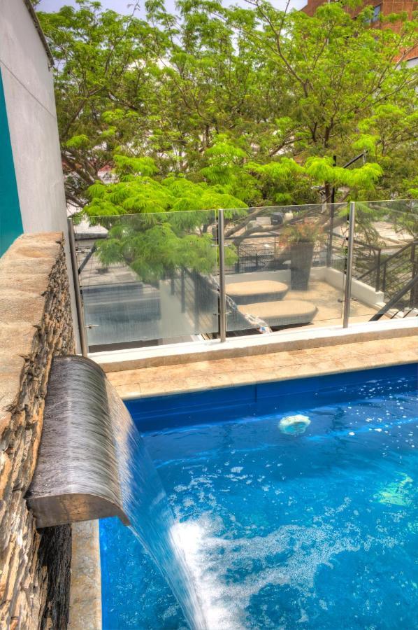 Casa de Leda, a Kali Hotel Santa Marta  Luaran gambar A pool barrier